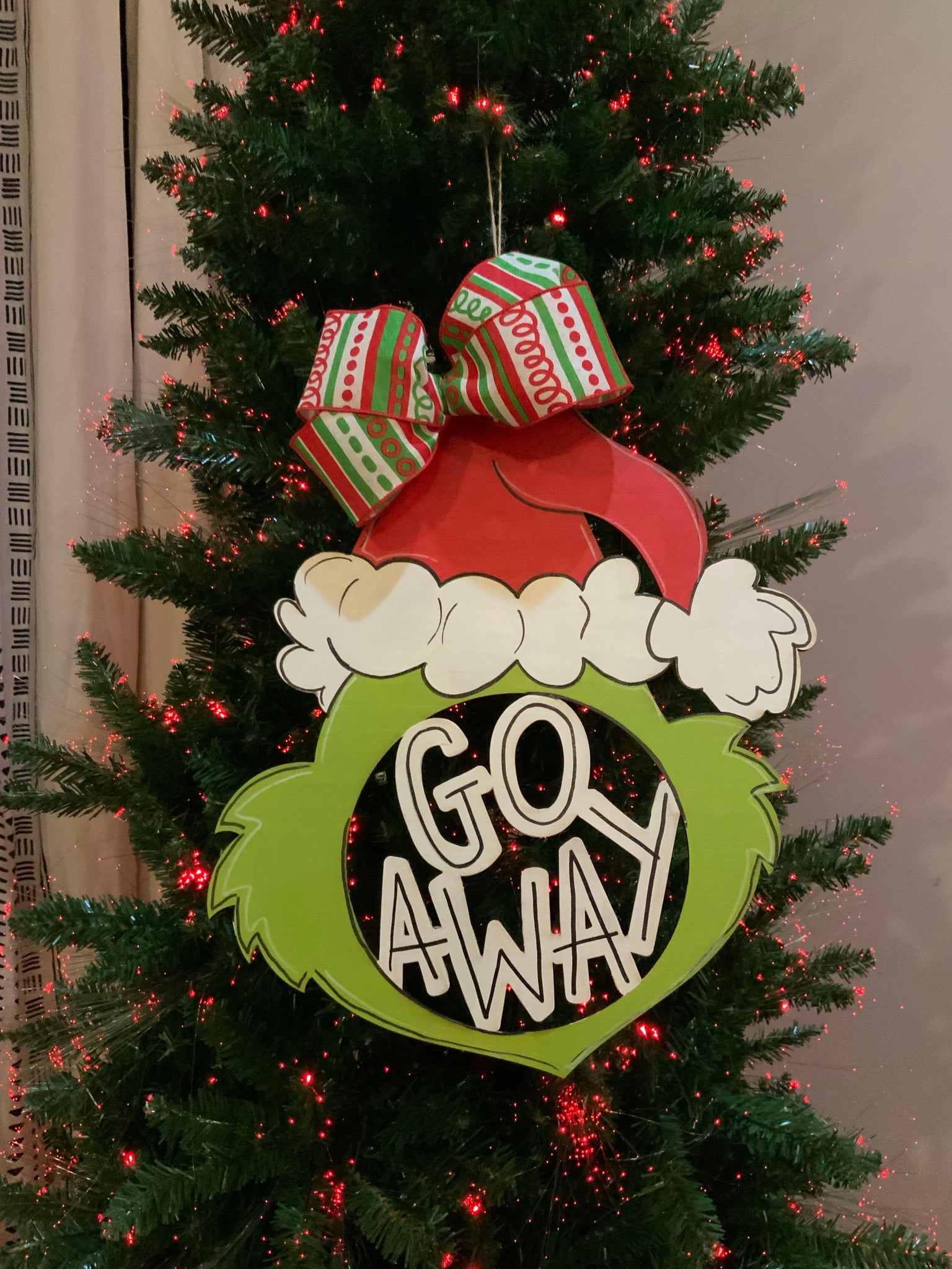 “go away” door hanger